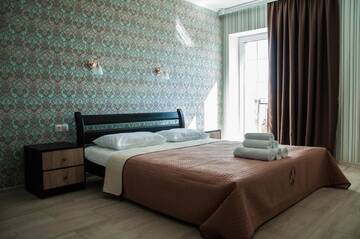 Улучшенный трехместный номер с видом на море в Гостевом доме Sun House